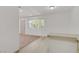 Open concept living room with a combination of wood look flooring and carpeted areas at 304 Orland St # 47, Las Vegas, NV 89107