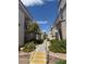 Inviting exterior view of building with landscaped pathways and lush surroundings in a well-maintained community at 3150 Soft Breezes Dr # 1167, Las Vegas, NV 89128