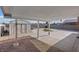 Spacious backyard features a covered patio, storage shed, and plenty of room for entertaining at 3715 Tabor Ave, North Las Vegas, NV 89030