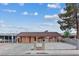 Charming single-story home with a well-maintained front yard and inviting curb appeal at 3715 Tabor Ave, North Las Vegas, NV 89030