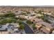 Community aerial view showcasing well-maintained homes and landscaping under a clear sky at 38 Moonfire Dr, Las Vegas, NV 89135