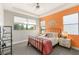 Bright bedroom with a ceiling fan, bedside tables and natural light at 38 Moonfire Dr, Las Vegas, NV 89135