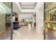 Spacious foyer with an open floor plan and abundant natural light with staircase and piano at 38 Moonfire Dr, Las Vegas, NV 89135