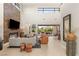 Bright living room with a modern fireplace, comfortable seating, and stylish decor at 38 Moonfire Dr, Las Vegas, NV 89135
