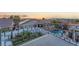 Beautiful balcony view overlooking manicured landscaping and a sparkling community pool at 387 Hoskins Ct, Henderson, NV 89012