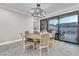 Cozy dining room with a round table, chairs, and access to outdoor patio at 387 Hoskins Ct, Henderson, NV 89012