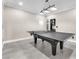 Game room displaying a ping pong table with lighting and tile flooring for entertainment at 387 Hoskins Ct, Henderson, NV 89012