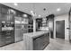 Contemporary kitchen showcasing a large island, stainless steel appliances, and plenty of storage at 387 Hoskins Ct, Henderson, NV 89012