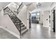 Modern staircase with stylish railing, leading to the upper level of the home at 387 Hoskins Ct, Henderson, NV 89012