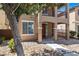 Charming two-story townhome featuring a quaint front porch and low-maintenance yard at 4351 Hera Temple Ave, North Las Vegas, NV 89031