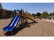 Close-up of a colorful playground slide and play structure, inviting for outdoor fun in the community at 4351 Hera Temple Ave, North Las Vegas, NV 89031