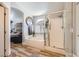 Primary bath with tub and separate shower with glass doors at 4361 Valley Quail Way, North Las Vegas, NV 89084