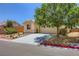 Charming single-story home featuring desert landscaping, a two-car garage, and a lovely shade tree at 4361 Valley Quail Way, North Las Vegas, NV 89084