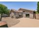 Private backyard features a concrete patio and a gravel area; ideal for outdoor entertainment at 4825 White Aspen Ave, Las Vegas, NV 89130