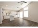 Bright, open-concept living space with hardwood floors and clerestory windows for natural light at 4825 White Aspen Ave, Las Vegas, NV 89130