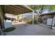 Expansive backyard with covered patio, picnic table, laundry area, and block wall fencing at 5209 Del Monte Ave, Las Vegas, NV 89146