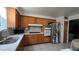 Well-equipped kitchen with modern appliances, ample counter space, and sleek backsplash at 5209 Del Monte Ave, Las Vegas, NV 89146