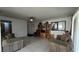 Spacious living room with tile floors, comfortable furniture, and ample natural light at 5209 Del Monte Ave, Las Vegas, NV 89146