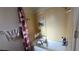 A bathtub with shower, featuring a shower curtain and built-in shelves at 5209 Del Monte Ave, Las Vegas, NV 89146