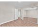 Bedroom with hardwood floors and neutral paint, a closet and doorway leading to another room at 5912 Kentlands St, Las Vegas, NV 89130