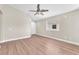 Bright living room with hardwood floors and neutral paint and a window to the outside at 5912 Kentlands St, Las Vegas, NV 89130