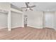 Bright living room with hardwood floors and neutral paint that leads to the entrance at 5912 Kentlands St, Las Vegas, NV 89130