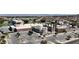 Overhead photograph showcasing a school in a residential area with ample parking, palm trees, and mountain views at 6112 Grape Blossom Ave, Las Vegas, NV 89142