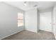 Comfortable bedroom featuring standard closet, carpet, and ceiling fan at 6112 Grape Blossom Ave, Las Vegas, NV 89142