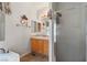 Bathroom featuring a standing shower, vanity with storage, and medicine cabinet at 6337 W Cactus Ave, Las Vegas, NV 89141