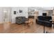 Spacious living room with wood floors and open access to other rooms at 6337 W Cactus Ave, Las Vegas, NV 89141