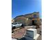 Charming two-story home with a two-car garage, desert landscaping, and a welcoming front entrance at 6412 Point Break St, North Las Vegas, NV 89084