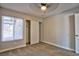 Bedroom featuring neutral walls, carpet flooring, a window, and a closet at 6848 Groveview Ln, Las Vegas, NV 89103