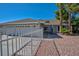 Charming single-story home featuring a three-car garage and low maintenance landscaping at 6848 Groveview Ln, Las Vegas, NV 89103