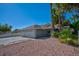 Charming single-story home featuring a three-car garage and low maintenance landscaping at 6848 Groveview Ln, Las Vegas, NV 89103