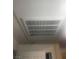 A white square air vent installed on a white ceiling at 6955 N Durango Dr # 2016, Las Vegas, NV 89149
