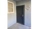 Secured front door with decorative ironwork and unit number 2016 at 6955 N Durango Dr # 2016, Las Vegas, NV 89149