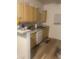 Functional kitchen features well-maintained cabinets and essential appliances at 6955 N Durango Dr # 2016, Las Vegas, NV 89149