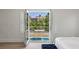 Cozy bedroom with access to a private balcony at 712 Proud Eagle Ln, Las Vegas, NV 89144