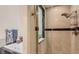 Modern bathroom featuring a glass-enclosed shower, a soaking tub, and contemporary fixtures at 7201 Mission Hills Dr, Las Vegas, NV 89113