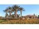 Spanish Trail community entrance with well-manicured landscaping and clear signage at 7201 Mission Hills Dr, Las Vegas, NV 89113