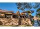 Back patio featuring a trellis, built in barbeque and plenty of space for outdoor lounging at 7201 Mission Hills Dr, Las Vegas, NV 89113