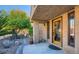 Charming home exterior with a stone pathway leading to a decorative glass front door at 7201 Mission Hills Dr, Las Vegas, NV 89113