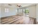 Bright bedroom featuring a ceiling fan and sliding glass doors to a balcony at 776 Tillis Pl, Las Vegas, NV 89138