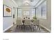 Bright dining room with natural light, a decorative light fixture and modern wall decor at 776 Tillis Pl, Las Vegas, NV 89138