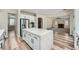 Open-concept kitchen with a large island and views into the living room and dining area at 776 Tillis Pl, Las Vegas, NV 89138