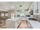 Spacious kitchen with a large island, modern appliances, and stylish backsplash at 776 Tillis Pl, Las Vegas, NV 89138