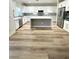 Spacious kitchen features an island, stainless steel appliances, and white cabinets at 776 Tillis Pl, Las Vegas, NV 89138