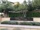 A beautiful 'Vista Verde' sign is surrounded by manicured landscaping and mature trees at 776 Tillis Pl, Las Vegas, NV 89138