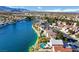 Stunning aerial view of lakefront community, highlighting the lake and neighborhood layout at 8416 Dry Cliff Cir, Las Vegas, NV 89128