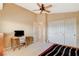 Bedroom featuring neutral colors, a ceiling fan, and closet with double doors at 8416 Dry Cliff Cir, Las Vegas, NV 89128